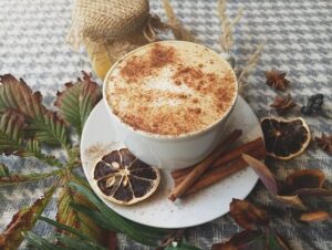 cinnamon sprinkled on coffee