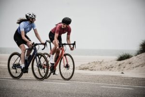 man and woman cycling