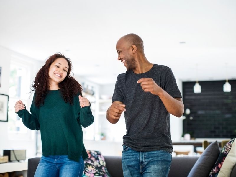 couple dancing at home