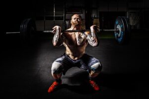 man doing heavy deadlift weights