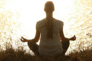 meditating by the river