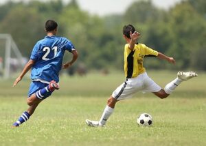 men playing soccer