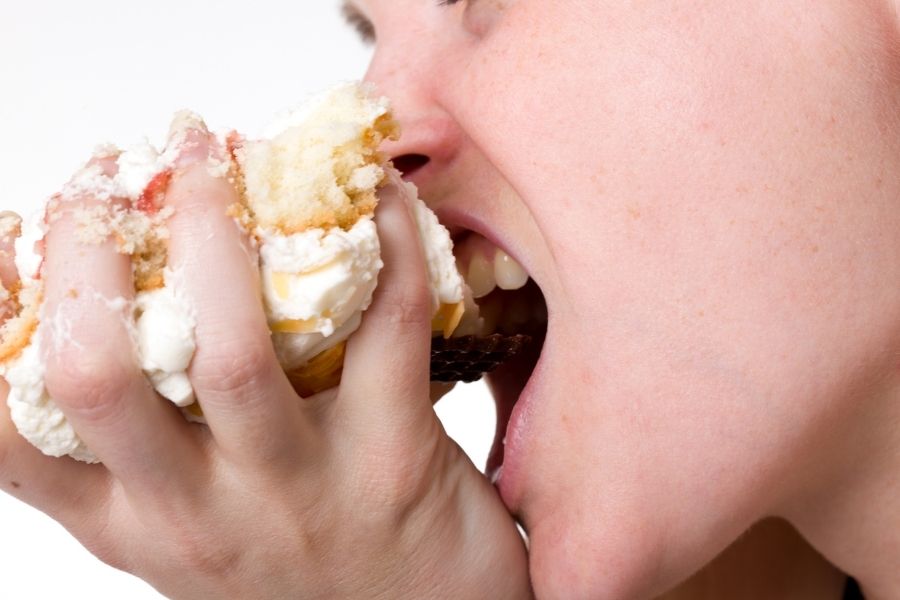 woman eating cake