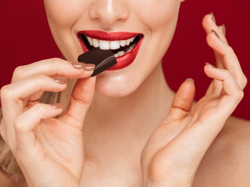 woman eating chocolate