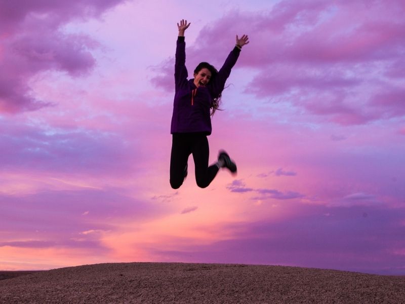 woman jumping for joy