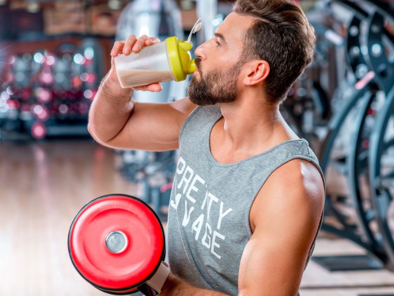 man drinking protein shake