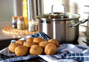 whole potatoes and boiling pot