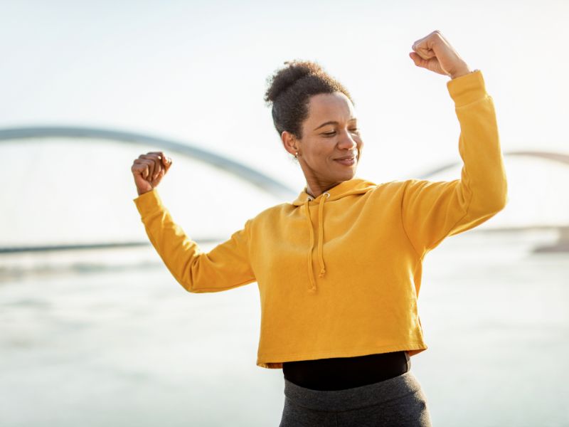 woman flexing muscles