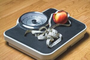 bathroom scales and measuring tape