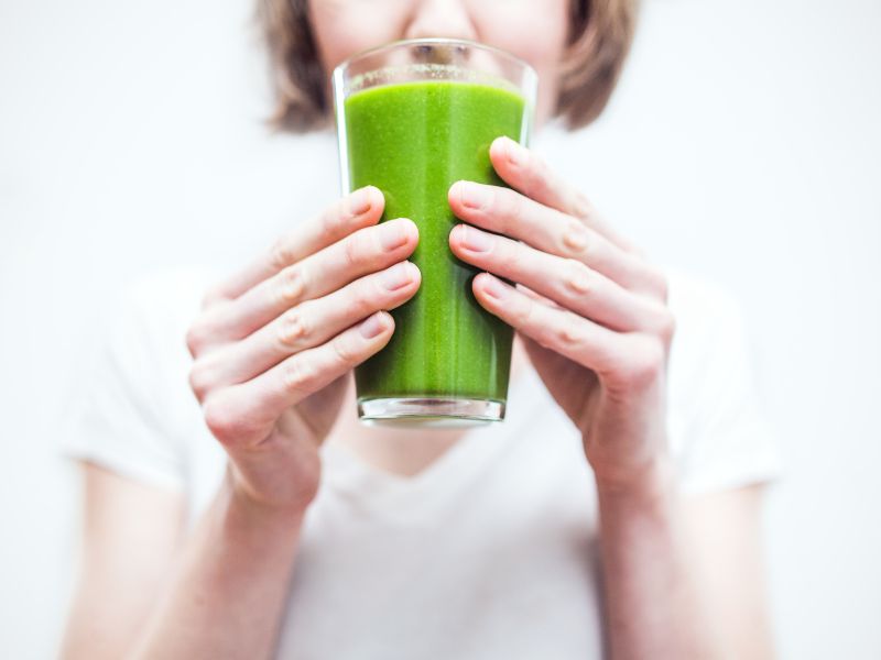 woman drinking smoothie