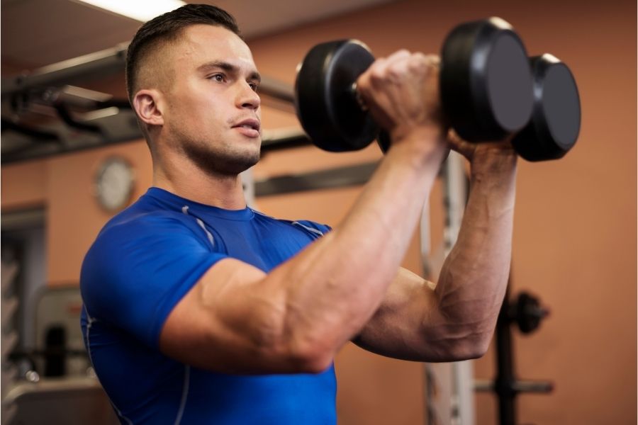 man doing bicep curls