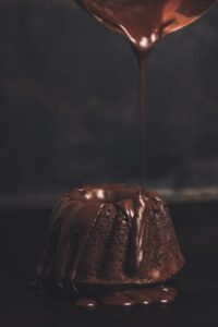 chocolate drizzled onto cake