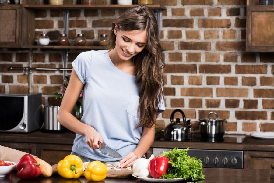 woman cooking healthy food